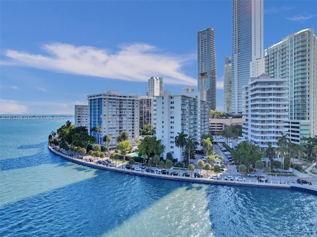 1408 Brickell Bay Dr Unit 411, Miami, FL 33131 - view of swimming pool with a water view and a city view