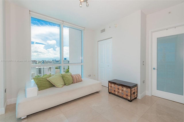 480 NE 30th St Unit 1505, Miami, FL 33137 - living room with baseboards and tile patterned flooring