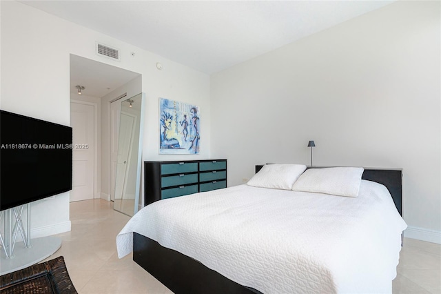480 NE 30th St Unit 1505, Miami, FL 33137 - bedroom featuring light tile patterned floors and baseboards