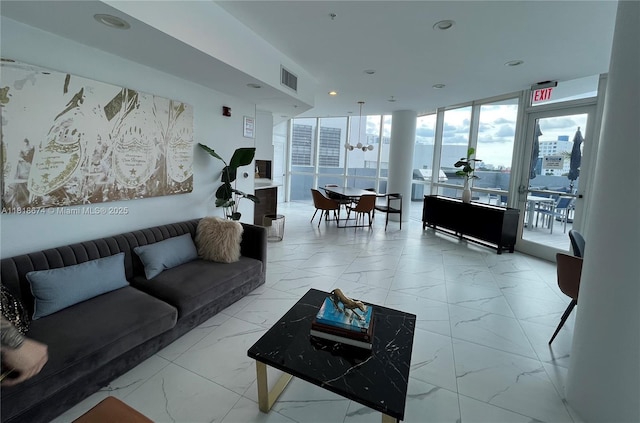 480 NE 30th St Unit 1505, Miami, FL 33137 - building lobby with floor to ceiling windows and recessed lighting