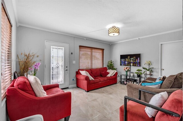 810 E 9th Pl, Hialeah, FL 33010 - living area featuring crown molding