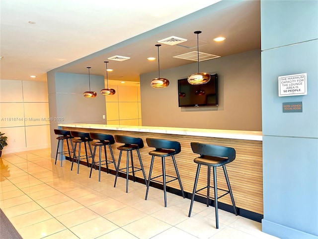 1250 S Miami Ave Unit 2310, Miami, FL 33130 - indoor dry bar featuring recessed lighting, light tile patterned floors, and pendant lighting