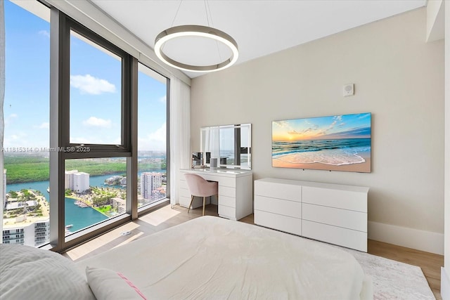15701 Collins Ave Unit 3101, Sunny Isles Beach, FL 33160 - bedroom featuring wood finished floors