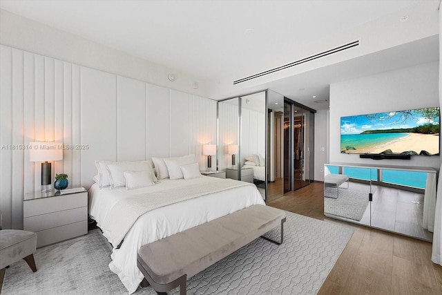 15701 Collins Ave Unit 3101, Sunny Isles Beach, FL 33160 - bedroom with wood finished floors