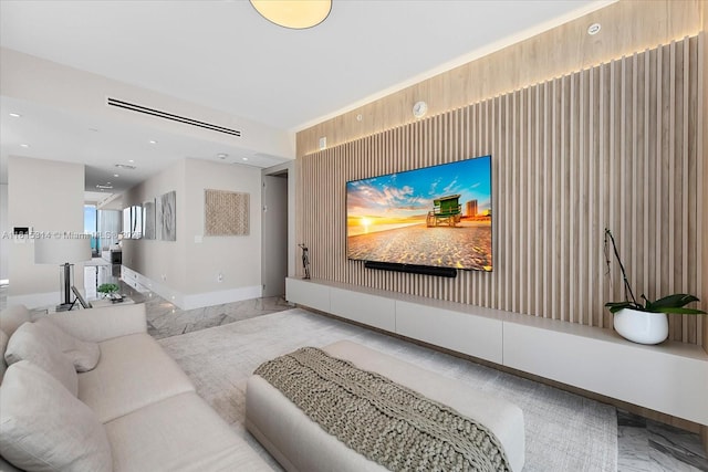 15701 Collins Ave Unit 3101, Sunny Isles Beach, FL 33160 - living room with marble look tiles, baseboards, and recessed lighting