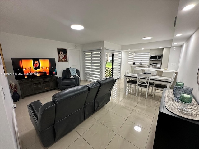 1140 Independence Trl Unit 1140-J, Homestead, FL 33034 - living area with light tile patterned flooring and recessed lighting