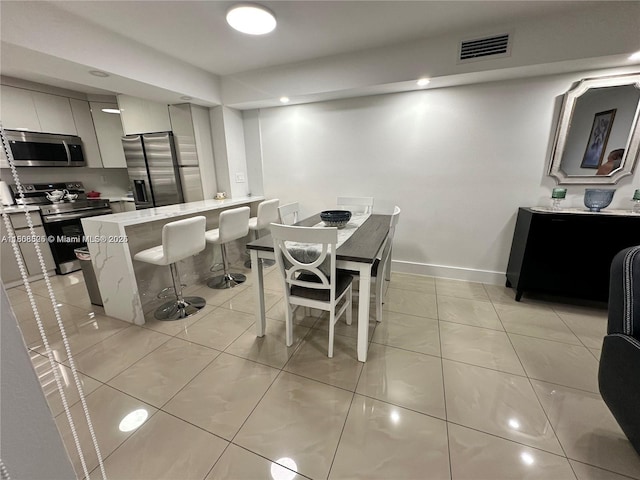 1140 Independence Trl Unit 1140-J, Homestead, FL 33034 - dining room with baseboards