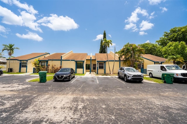 7382 NW 34th St, Lauderhill, FL 33319 - view of front facade featuring uncovered parking and stucco siding