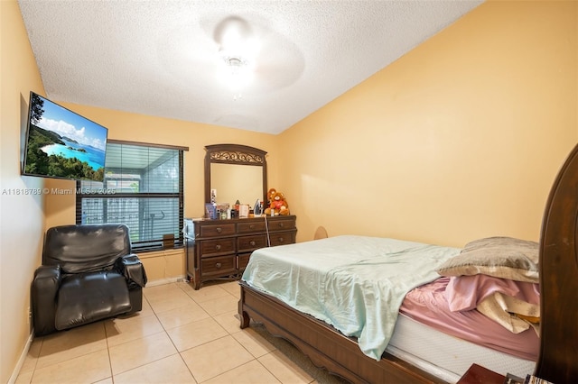 7382 NW 34th St, Lauderhill, FL 33319 - bedroom with a textured ceiling, light tile patterned floors, baseboards, and vaulted ceiling