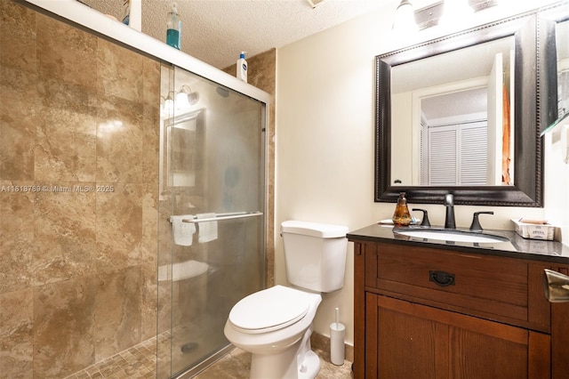 7382 NW 34th St, Lauderhill, FL 33319 - bathroom with toilet, vanity, a shower stall, and a textured ceiling
