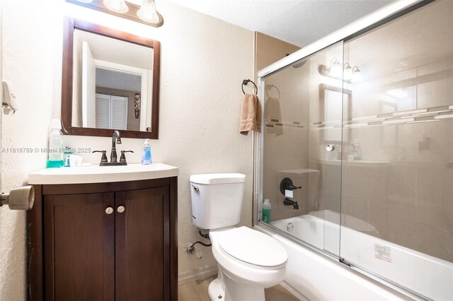 7382 NW 34th St, Lauderhill, FL 33319 - full bath with toilet, vanity, and shower / bath combination with glass door