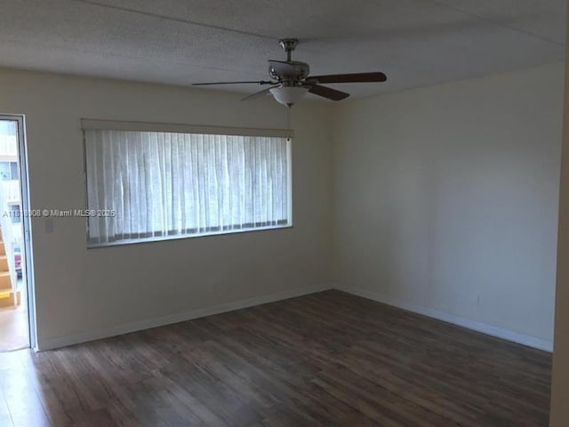600 Village Green Ct Unit 222, Palm Springs, FL 33461 - spare room featuring plenty of natural light, wood finished floors, and ceiling fan
