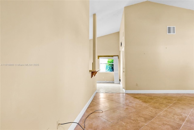 8663 Spring Valley Dr, Boynton Beach, FL 33472 - hall with high vaulted ceiling, light tile patterned floors, and baseboards