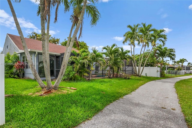 8663 Spring Valley Dr, Boynton Beach, FL 33472 - view of yard with glass enclosure