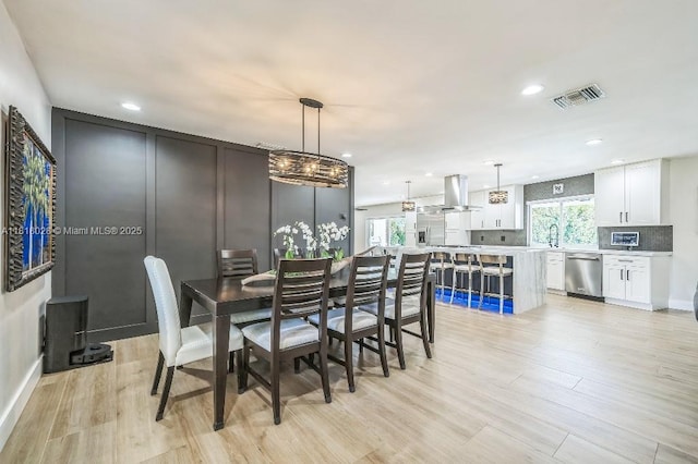 8005 SW 89th St, Miami, FL 33156 - dining room featuring light wood-style flooring and recessed lighting