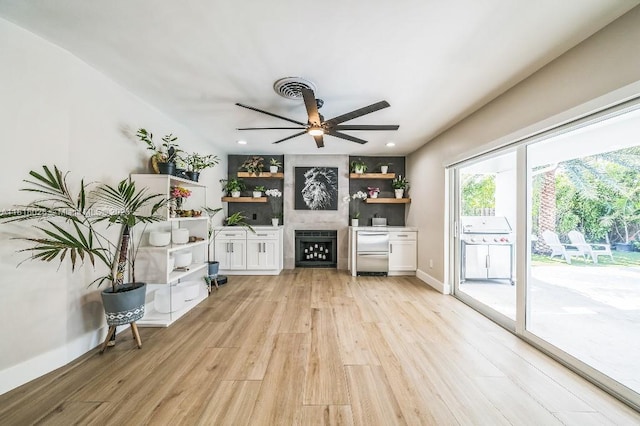 8005 SW 89th St, Miami, FL 33156 - living area featuring light wood-style floors, ceiling fan, a large fireplace, and recessed lighting