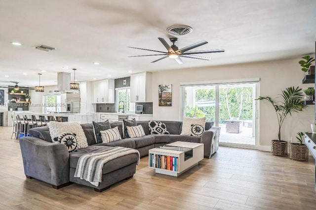 8005 SW 89th St, Miami, FL 33156 - living room featuring a ceiling fan, recessed lighting, and light wood-style flooring