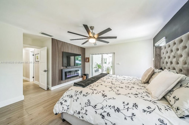 8005 SW 89th St, Miami, FL 33156 - bedroom featuring access to exterior, light wood-style floors, and ceiling fan