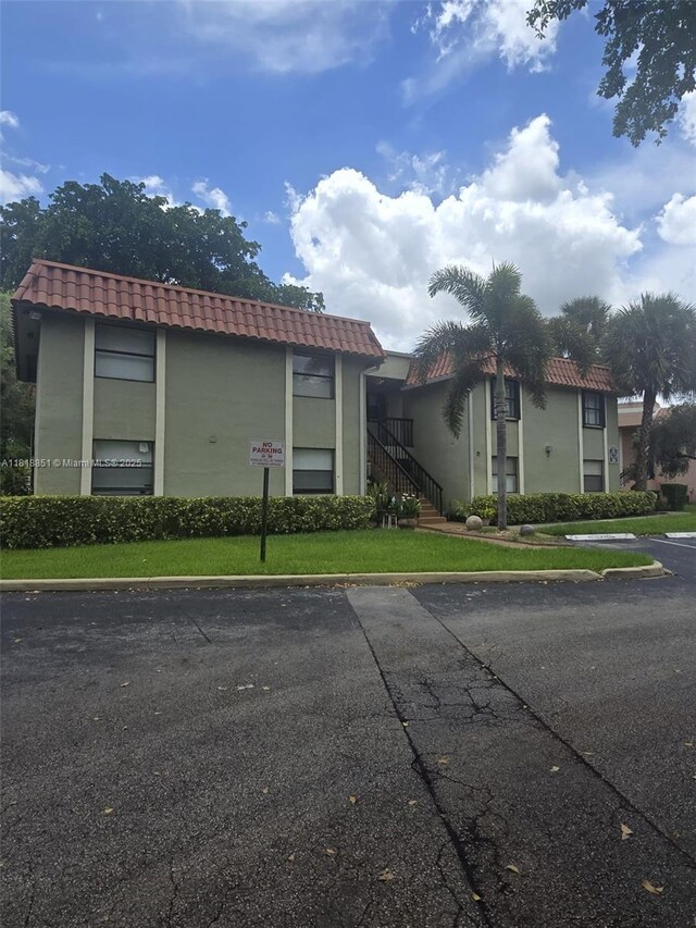 9808 Hammocks Blvd Unit 203-23, Miami, FL 33196 - view of property with uncovered parking