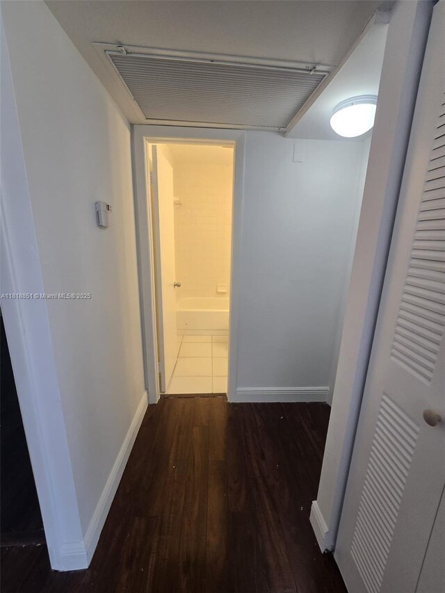 9808 Hammocks Blvd Unit 203-23, Miami, FL 33196 - hallway with wood finished floors and baseboards