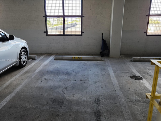 4242 NW 2nd St Unit 1202, Miami, FL 33126 - view of car parking with a parking deck