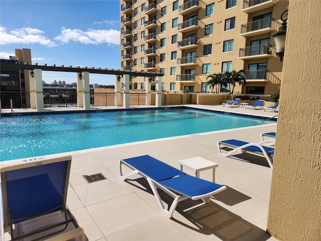 4242 NW 2nd St Unit 1202, Miami, FL 33126 - community pool with a patio