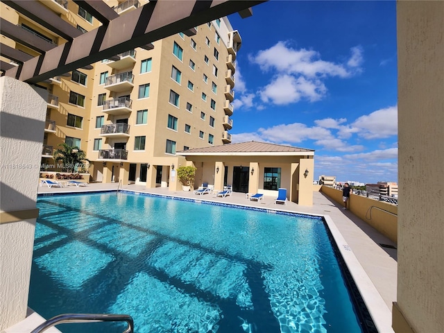 4242 NW 2nd St Unit 1202, Miami, FL 33126 - community pool featuring a patio area