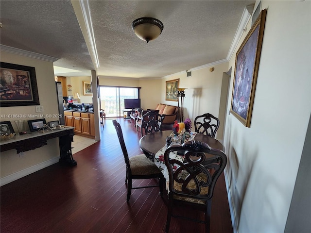 4242 NW 2nd St Unit 1202, Miami, FL 33126 - dining area featuring a textured ceiling, wood finished floors, and crown molding