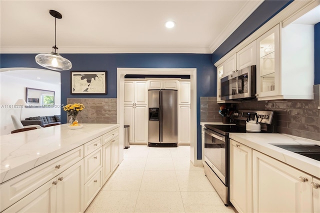 261 SW 30th Rd, Miami, FL 33129 - kitchen featuring stainless steel appliances, glass insert cabinets, backsplash, decorative light fixtures, and ornamental molding