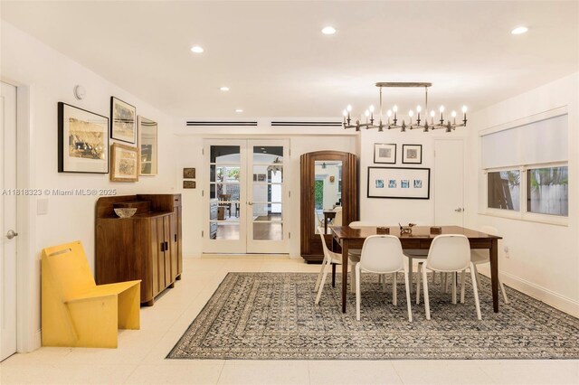 261 SW 30th Rd, Miami, FL 33129 - dining area with arched walkways, a chandelier, french doors, and recessed lighting