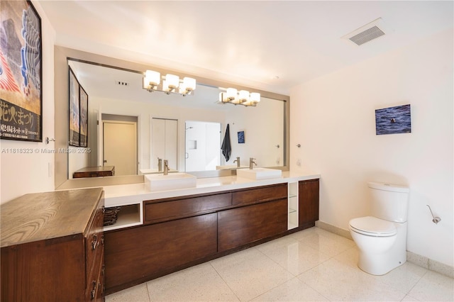 261 SW 30th Rd, Miami, FL 33129 - bathroom with baseboards, vanity, and toilet