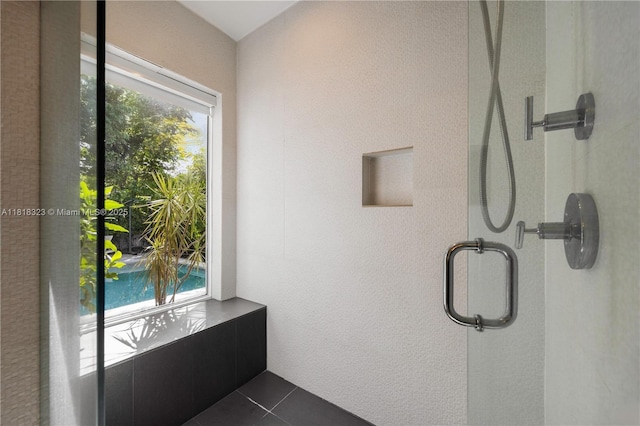 261 SW 30th Rd, Miami, FL 33129 - bathroom with tile patterned flooring and an enclosed shower