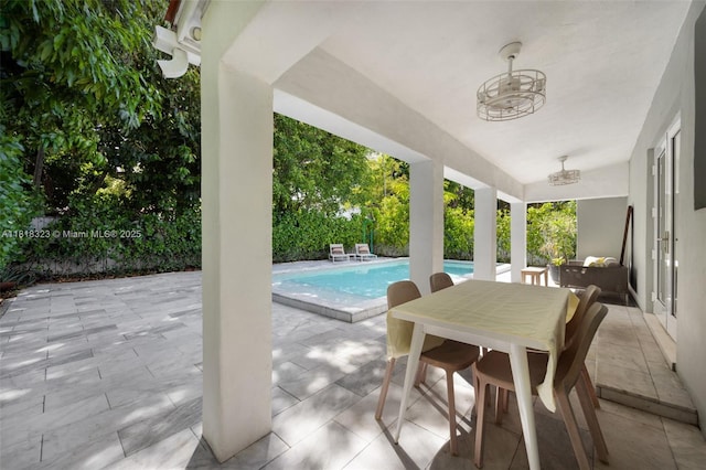 261 SW 30th Rd, Miami, FL 33129 - view of patio / terrace with an outdoor pool