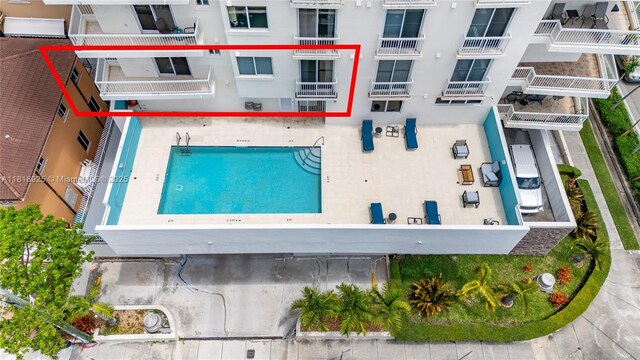 2400 SW 27th Ave Unit 402, Miami, FL 33145 - aerial view of property and surrounding area featuring a pool area and apartment complex