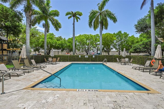 8440 SW 8th St Unit 306A, Miami, FL 33144 - community pool with a patio area
