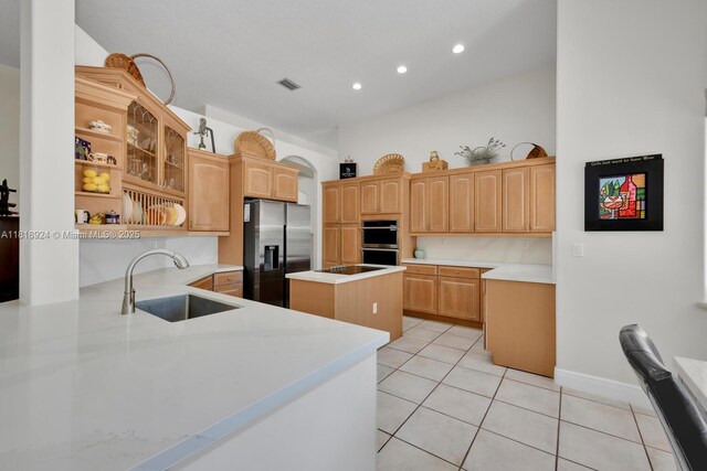 6129 SW 74th Ct, Miami, FL 33143 - kitchen featuring stainless steel appliances, recessed lighting, light countertops, a kitchen island, and light tile patterned floors