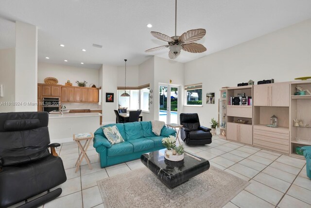 6129 SW 74th Ct, Miami, FL 33143 - living room with light tile patterned floors, a ceiling fan, and recessed lighting