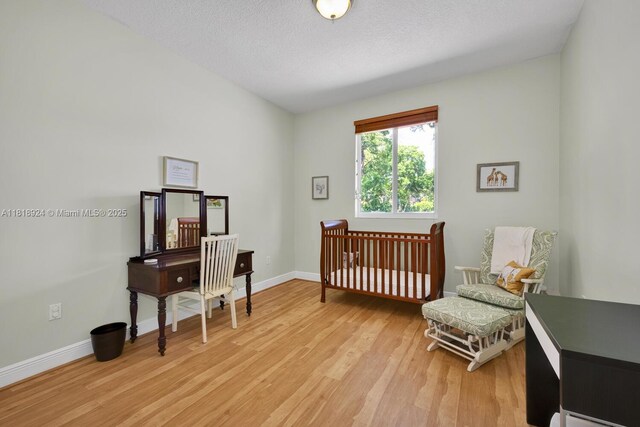 6129 SW 74th Ct, Miami, FL 33143 - bedroom with light wood-style floors and baseboards