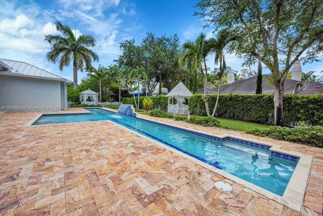 6129 SW 74th Ct, Miami, FL 33143 - view of swimming pool featuring a patio and a gazebo