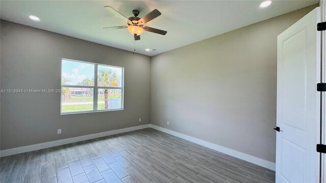 1115 Leader St, La Belle, FL 33935 - empty room featuring ceiling fan, baseboards, wood finished floors, and recessed lighting