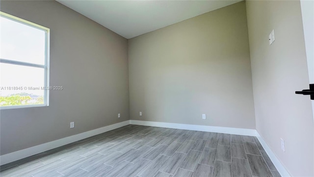 1115 Leader St, La Belle, FL 33935 - empty room with baseboards and wood finished floors
