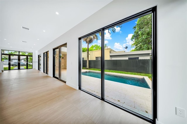 1513 SW 11th Ter, Miami, FL 33135 - doorway to outside with recessed lighting