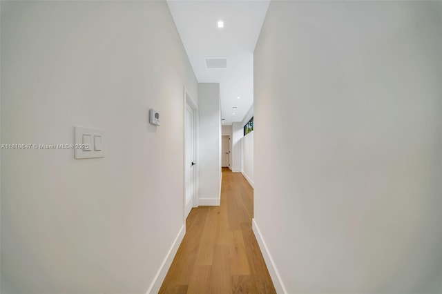 1513 SW 11th Ter, Miami, FL 33135 - corridor featuring baseboards, light wood-style floors, and recessed lighting