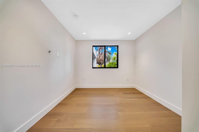 1513 SW 11th Ter, Miami, FL 33135 - unfurnished room with baseboards, light wood-style flooring, and recessed lighting