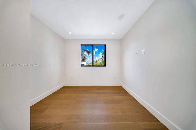 1513 SW 11th Ter, Miami, FL 33135 - unfurnished room featuring wood finished floors, baseboards, and a smoke detector