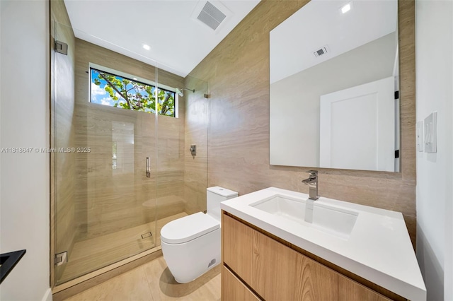 1513 SW 11th Ter, Miami, FL 33135 - bathroom with toilet, vanity, a stall shower, and tile walls
