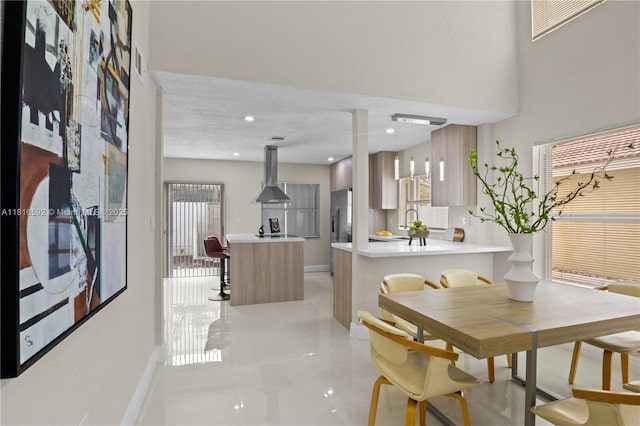 12633 NW 12th Ct, Sunrise, FL 33323 - dining area featuring baseboards, light tile patterned flooring, and recessed lighting