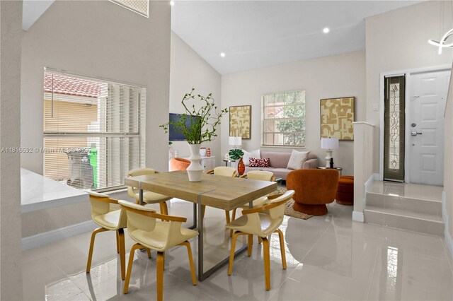 12633 NW 12th Ct, Sunrise, FL 33323 - dining area with baseboards, light tile patterned floors, recessed lighting, and a high ceiling