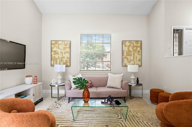 12633 NW 12th Ct, Sunrise, FL 33323 - tiled living room with baseboards