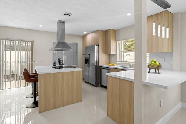12633 NW 12th Ct, Sunrise, FL 33323 - kitchen with appliances with stainless steel finishes, island exhaust hood, a sink, modern cabinets, and light countertops